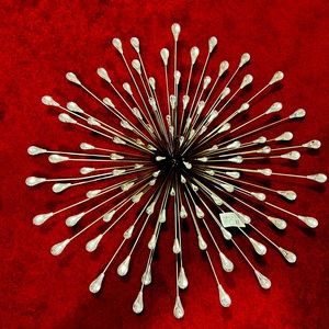 A radiant wall hanging of starburst flare!!!